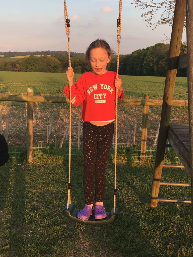 Travelbetter-Girl-on-a-swing