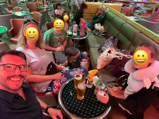 The Travelbetter team enjoying a drink on a ferry.